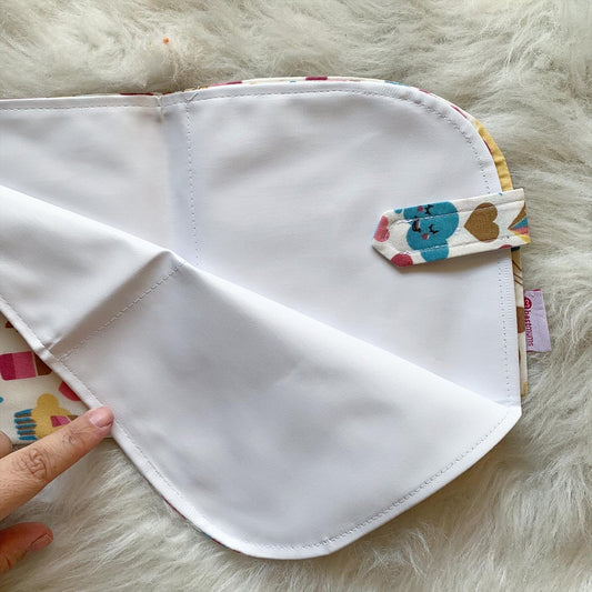 Unicorn changing mat unfolded showing waterproof side