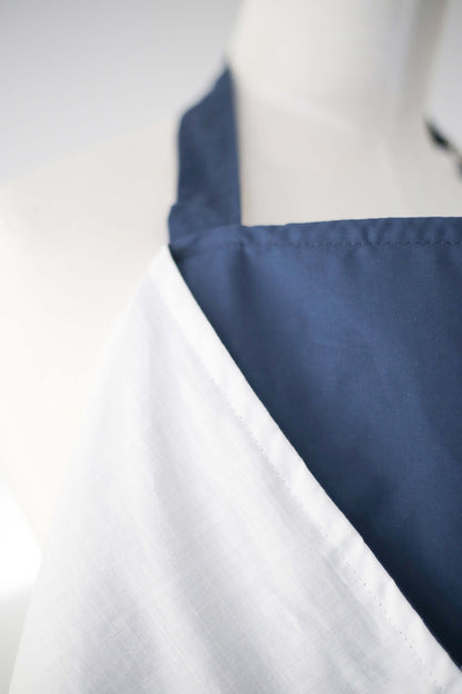 Close-up of navy blue linen nursing cover fabric
